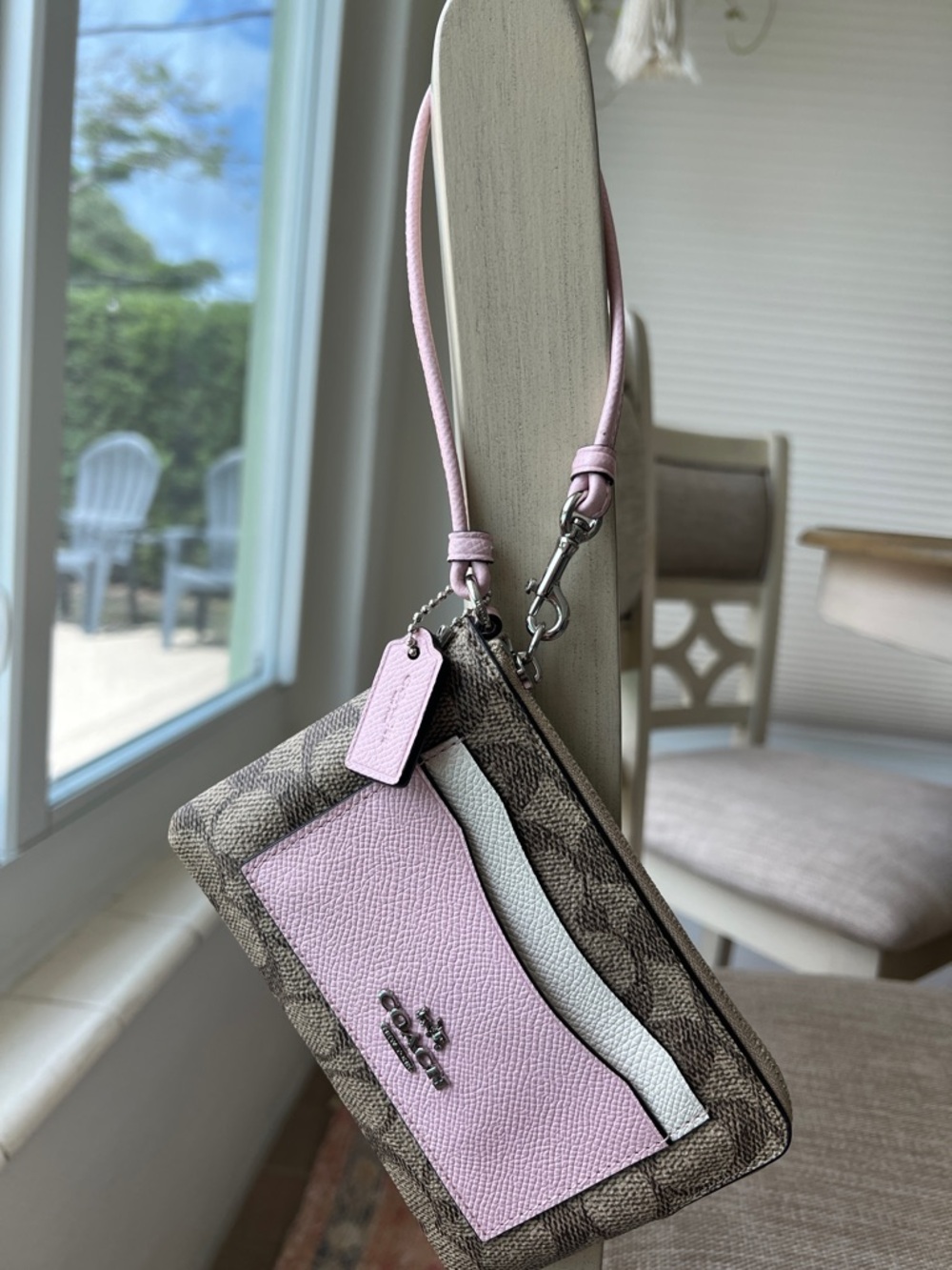 Coach Signature Canvas Wristlet Brown with Pale Pink & Cream Accents.